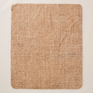 Couverture Sherpa Brown burlap posé sur une feuille blanche. dossie