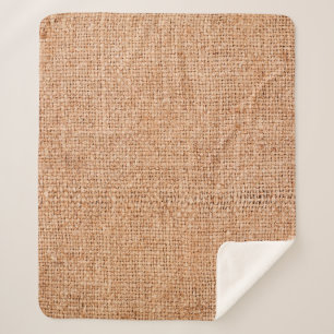 Couverture Sherpa Brown burlap posé sur une feuille blanche. dossier