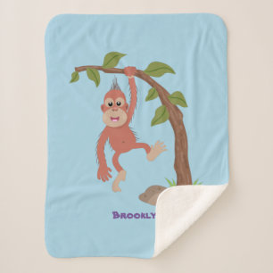 Couverture Sherpa Caricature de bébé orangoutan joyeux