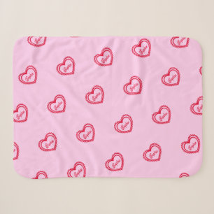 Couverture Sherpa Coeurs rouges personnalisés sur un joli rose