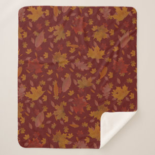 Couverture Sherpa Feuille d'automne d'or décoratif sur rouge foncé