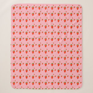 Couverture Sherpa Fraises rouges sur arrière - plan rose