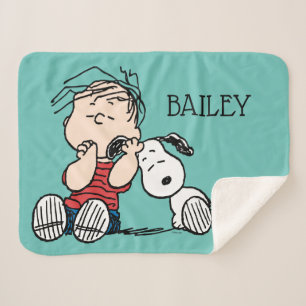Couverture Sherpa Linus consolé avec l'oreille de Snoopy