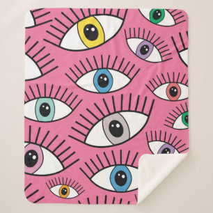 Couverture Sherpa Motif magique aux yeux colorés. Contexte mystique