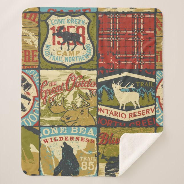 Couverture Sherpa Panneau d'aventure et symbole patchw des territoir (Devant)