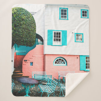 COUVERTURE SHERPA TEAL AND GRAY TABLE AND BENCH BESIDE WHITE AND ORA