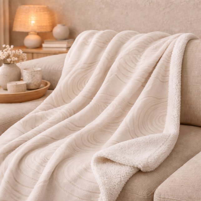 Couverture Sherpa Zen Stone Ripple (Stone-inspired ripple pattern in light tan flowing across smooth ivory)