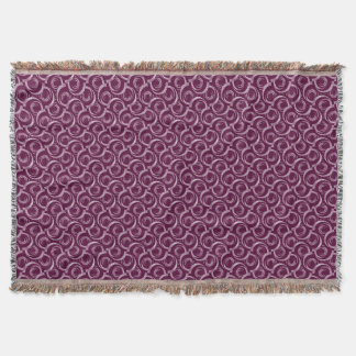 Couverture White ornament on a burgundy background.