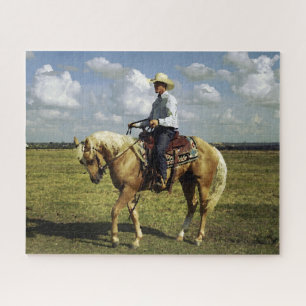Cowboy auf einem Palomino-Pferd