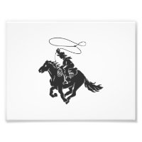 Cowboy auf Pferd mit Lasso