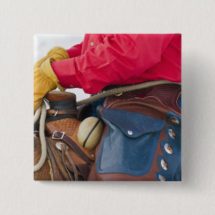 Cowboy auf Pferd mit Lederklappen Button