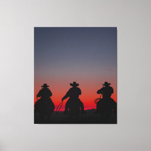 Cowboy bei Sonnenuntergang Leinwanddruck
