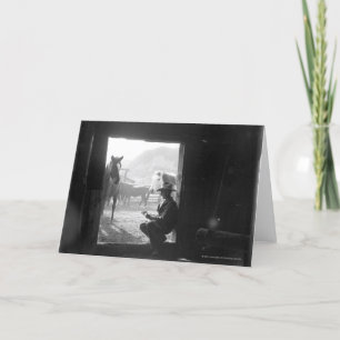 Cowboy in einem Eingang mit Pferden Karte