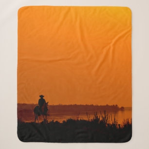 Cowboy Männer beim Reiten bei Sonnenuntergang Vint Sherpadecke