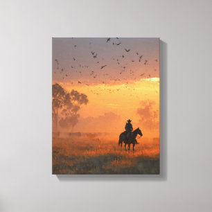 Cowboy reitet in den feurigen Sonnenuntergang Kuns Leinwanddruck