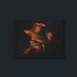 Cowboyhut und Lederstiefel rustikale Maskuline Leinwanddruck<br><div class="desc">Auf dem Boden stehen ein Paar schwarze Lederkuschelstiefel mit einem braunen Cowboy,  der über den Boden gezogen ist.</div>