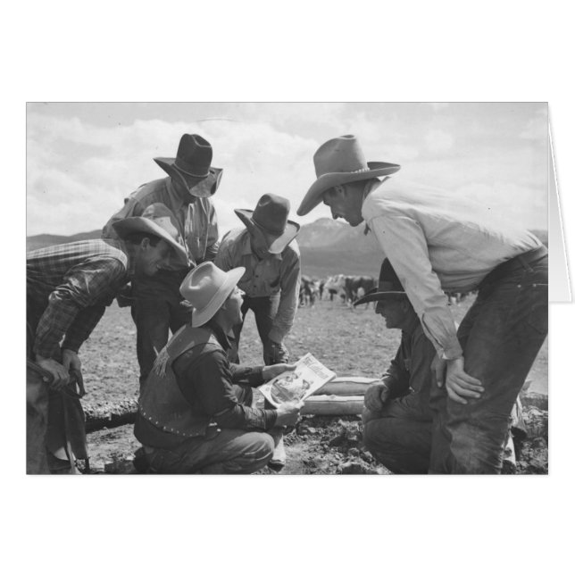 Cowboys, die eine Zeitschrift betrachten (Vorderseite (Horizontal))
