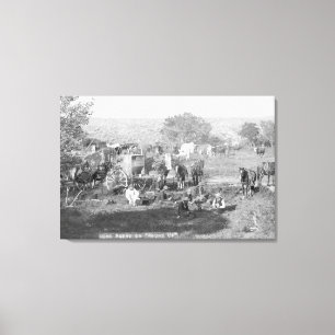 Cowboys, die um eine Campingplatz-Fotografie essen Leinwanddruck