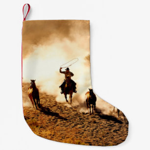 Cowboys jagen wilde Pferde. Zäumen und Reiten, Kleiner Weihnachtsstrumpf