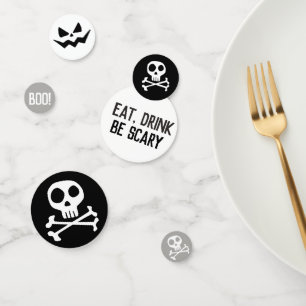 Crâne et confettis éffrayants de Halloween d'os