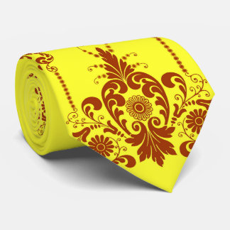 Cravate fleurs jaunes et impression de volutes