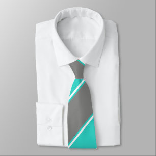 Cravate turquoise et argentée diagonalement rayée
