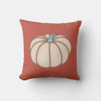 Cream Pumpkin auf dem dunkelorangefarbenen Kissen