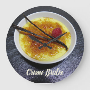 Creme brulae auf Tonschiefer mit Himbeere und Vani Große Wanduhr