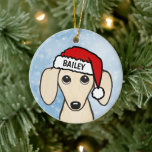 Creme Dackel Santa Dackel Hund Individuelle Name Keramik Ornament<br><div class="desc">Ein bezauberndes englisches Cream Dackel Weihnachtsschmuck, das mit Ihrem eigenen Text personalisiert werden kann. Fügen Sie einen Namen für ein lustiges individuelles Geschenk hinzu. Schmuckstücke, die auf dem Weihnachtsbaum noch für viele Jahre ausgestellt werden. Besuchen Sie Jenn’s Doodle World für noch mehr Urlaubsgeschenke mit diesem niedlichen Dackel Hund Design und...</div>