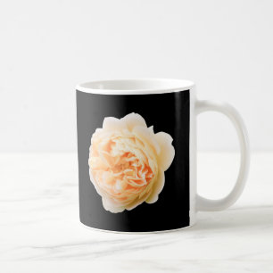 Creme-Rose abgeschieden auf schwarzem Hintergrund Kaffeetasse