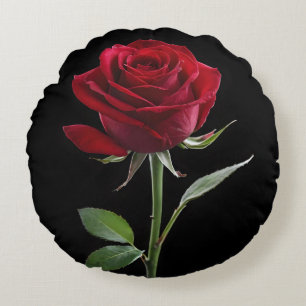 Crimson auf Ebenholz: Die einzelne rote Rose Rundes Kissen