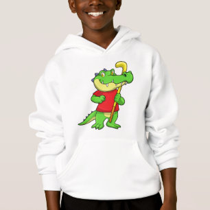 Crocodile à Field hockey avec bâton