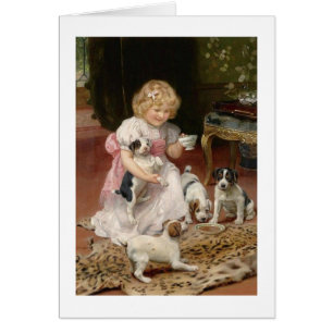 Cru - le thé d'un enfant avec ses chiots,