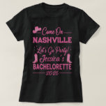 Custom Barbiecore Cowboy Bachelorette Party  T-Shirt<br><div class="desc">The Ultimate Barbiecore Cowboy Matching Bachelorette T-Shirt! Get your Bride Tribe ready! These bold, hot pink shirts are perfect for a matching group look for any bachelorette party. This Barbiecore design features a sparkly cowboy hat and pink western boots for the ultimate "Last Rodeo" vibe. Fully Customizable for Any City!...</div>