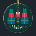 Custom Christmas Personalisiert Nutcracker Keramik Ornament<br><div class="desc">Eine farbenfrohe und festliche Weihnachts Nutcracker Illustration. Erstellt mit geometrischen Formen und fett formatierten Primärfarben. Dieses Design kann mit einem Namen oder einer benutzerdefinierten Meldung personalisiert werden. Die Farben sind rot,  waldgrün,  türkis,  blau rosa,  gold,  weiß und schwarz.</div>