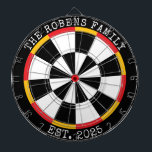 Custom Family Name Rustic Dartboard Dartscheibe<br><div class="desc">A dartboard is a popular recreational and competitive game that provides hours of fun for players of all ages and skill levels. Typically made from sisal fibers, cork, or electronic components, dartboards are designed to withstand the impact of darts while offering precise scoring zones. Standard dartboards feature a circular design...</div>