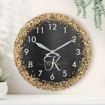 Custom Gold Glitzer Black Sparkgram Monogram Große Wanduhr<br><div class="desc">Dieses trendige,  elegante Uhrendesign mit hübschem vergoldeten Glitzer auf schwarz gebürstetem metallischem Hintergrund ist einfach zu personalisieren.</div>