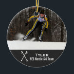 Custom Nordic Cross Country Skiing Photo Collage Keramikornament<br><div class="desc">This nordic cross country skiing photo collage design features your photo(s) and 2 lines of custom text - add your ski team name and/or skier's name. Criss-crossed ski poles complete the design. Great for an "all-team" end of season gift or coach/ski instructor. Change the background color to match your ski...</div>