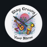 Custom Wall Clock | Retro Octopus | Name & Text Runde Wanduhr<br><div class="desc">✨ Add groovy retro vibes to your wall with this custom octopus clock!
🖊️ Customize the top phrase   add any name for a one-of-a-kind gift.
🕒 Perfect for home decor,  offices,  dorm rooms,  and kids’ spaces.
🎁 Great for birthdays,  holidays,  and personalized surprises.</div>