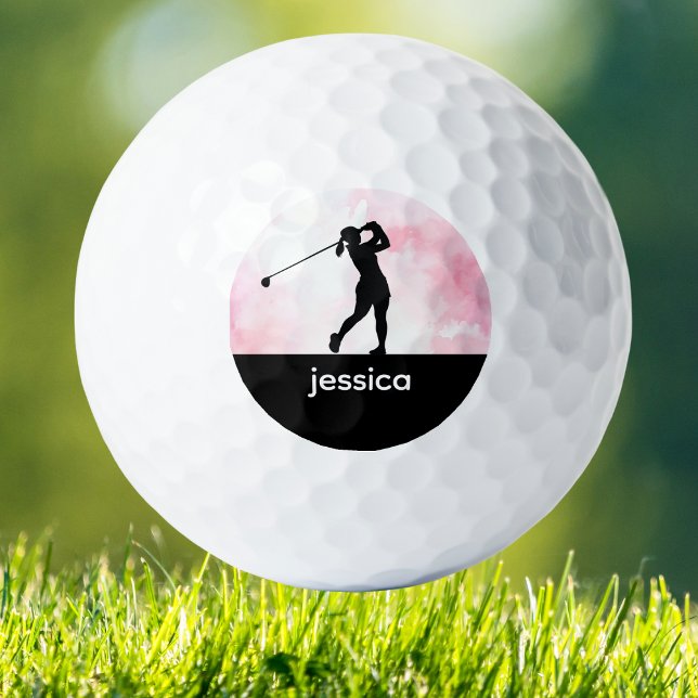 Custom Woman Golf Balls Golfball (Chic pink watercolor golf ball with woman golfer design, custom monogram, and stylish feminine flair)