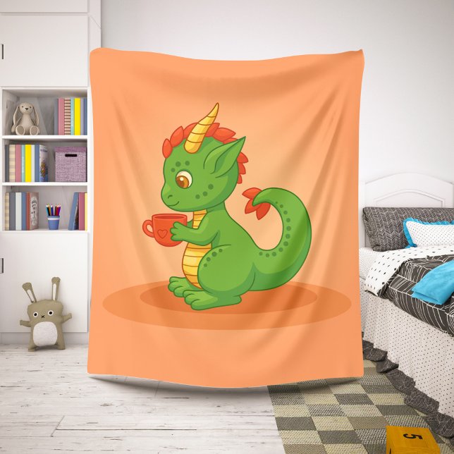 Cute Baby Dragon Holding Cup on Orange Sherpadecke (Von Creator hochgeladen)