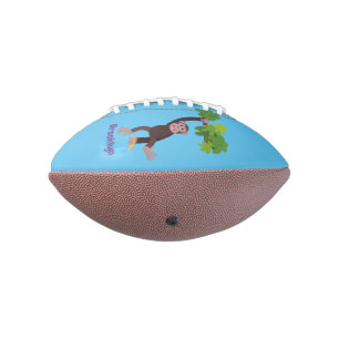 Cute chimpanzee in jungle hanging cartoon football