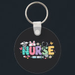 Cute Easter Nurse Medical Humor Schlüsselanhänger<br><div class="desc">Colorful lettering with a nurse hat,  stethoscope,  flowers and playful medical symbols. A cheerful graphic celebrating caring nurses and healthcare professionals during the Easter season with a bright and friendly hospital atmosphere.</div>