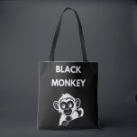 Cute Little Black Monkey Tasche<br><div class="desc">Meet your new favorite jungle friend! This adorable peeking monkey design features a clean,  white illustration that pops perfectly on dark fabrics. A fun and playful choice for kids,  wildlife enthusiasts,  or anyone who loves a bit of monkey business.</div>