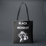 Cute Little Black Monkey Tasche<br><div class="desc">Meet your new favorite jungle friend! This adorable peeking monkey design features a clean,  white illustration that pops perfectly on dark fabrics. A fun and playful choice for kids,  wildlife enthusiasts,  or anyone who loves a bit of monkey business.</div>