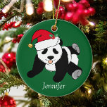 Cute Panda Bear Kids Monogram Christmas Keramik Ornament<br><div class="desc">This pretty panda bear Santa Claus Christmas ornament is a beautiful animal holiday gift for a child who loves panda bears. I like wild animals and a Christmas panda bear takes the cake wearing a red Santa hat! Personalize this green gift with a name.</div>