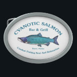 Cyanotic Lachs Bar & Grill Ovale Gürtelschnalle<br><div class="desc">Ein blauer Sockeye Lachs mit Text, der "Cyanotic Lachs Bar & Grill Kenai, Alaska" und "Bekämpfen Sie die Erholung und Entspannung der Fischerei. Die Lachsfischerei ist sehr beliebt und in Alaska zu beliebt. Stellen Sie sich hundert Angler vor, ungefähr Schulter zu Schulter, die beide Ufer eines Baches belästigen und versuchen,...</div>