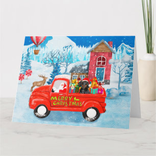 Dachshund-Hund im Weihnachtslieferwagen Schnee Karte
