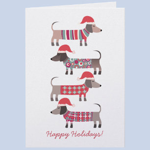 Dachshund-Hunde in Weihnachtsmannmützen Weihnachte