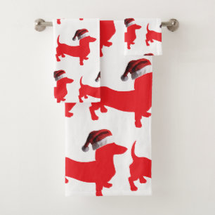 Dachshund rouge portant un Casquette du Père Noël